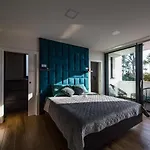 Lisa By Belmont Realty *