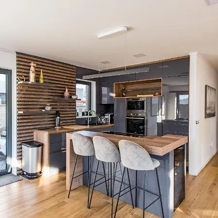 Lisa By Belmont Realty *