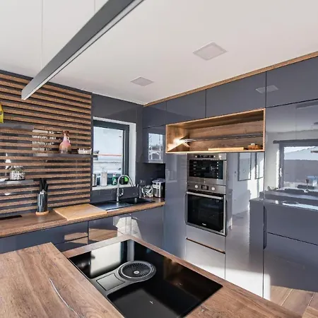 Lisa By Belmont Realty